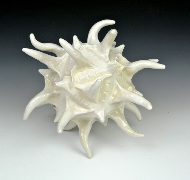 Ceramic sculpture of a biological polyhedral form, third view.