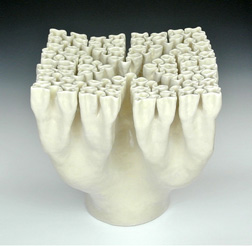 Organic-looking ceramic sculpture based on a crosses fractal, second view.
