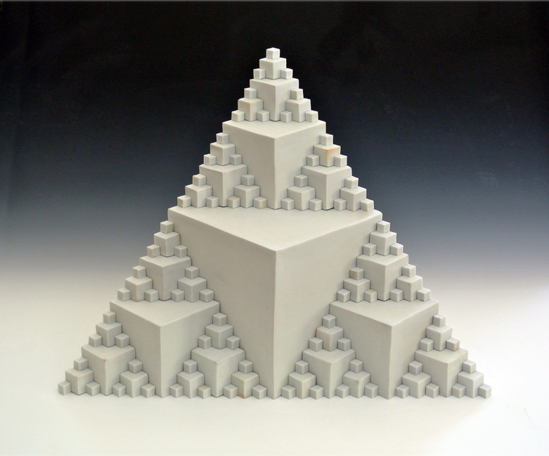Ceramic sculpture of a set of cubes in a fractal arrangement.