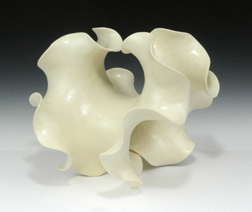 Negative-curvature abstract ceramic sculpture based on a two-fold saddle surface.